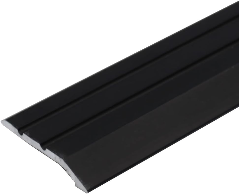 Anodised aluminium transition strip installed in doorway