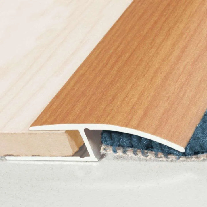 A62 40mm anodised aluminium door threshold ramp profile fitted in a UK doorway to smooth uneven floor levels.