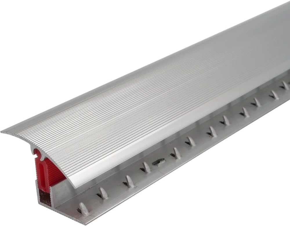 Pivoting aluminium threshold strip for carpet and hard flooring transition