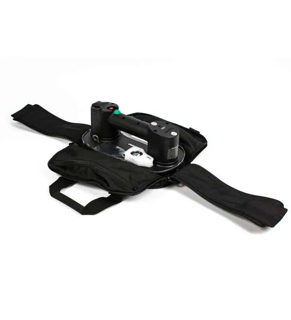 Grabo Plus electric vacuum lifter with gauge and carry case lifting a large tile slab on a job site. 1