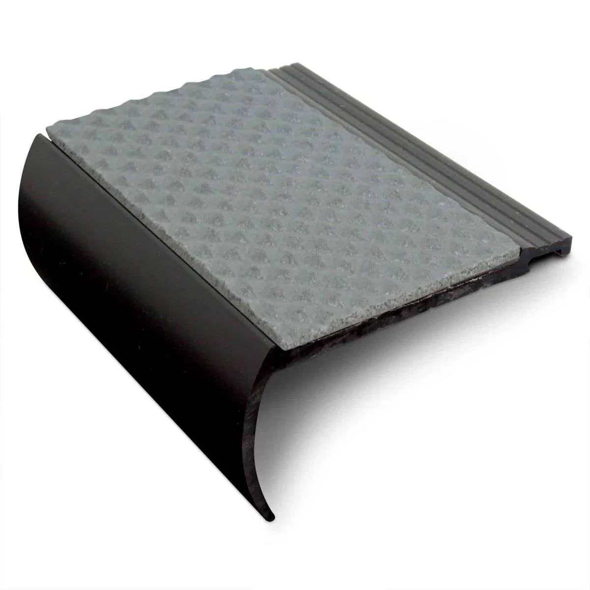 NHB 72x38mm Tredsafe non-slip heavy duty hard nose PVC stair nosing installed on stairs for safety and durability. 1