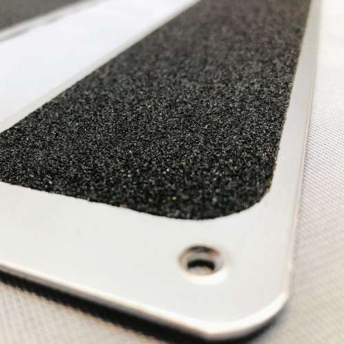 Stainless steel treadplates installed on stairs, providing durable, slip-resistant, and corrosion-resistant surfaces. 1