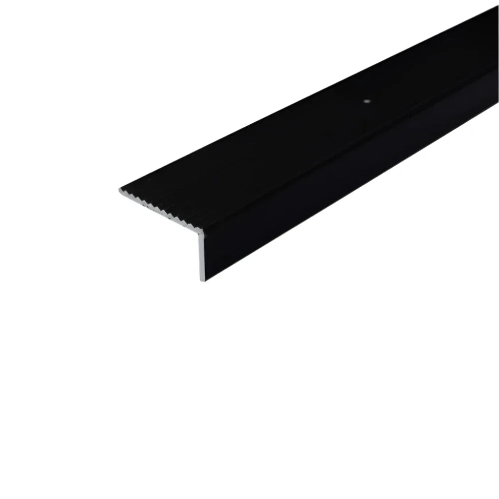 A33 40x20mm anodised aluminium non-slip ribbed stair nosing fitted to stairs for improved grip and edge protection. 2