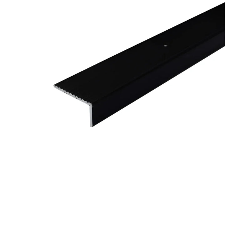 A33 40x20mm anodised aluminium non-slip ribbed stair nosing fitted to stairs for improved grip and edge protection. 2
