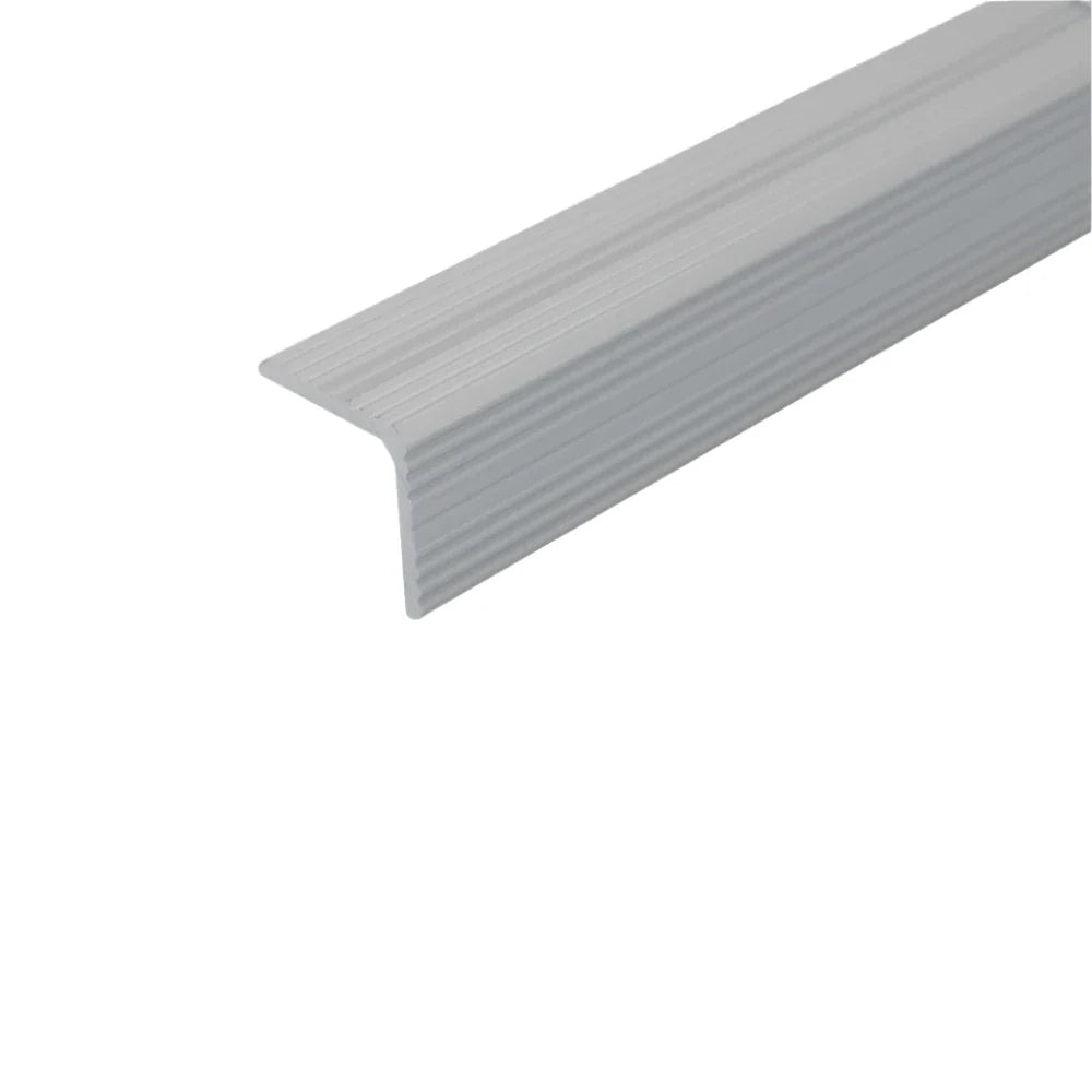 A40 25x25mm anodised aluminium non-slip ribbed stair nosing fitted to stairs for improved grip and edge protection. 5