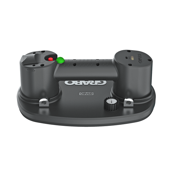 Grabo Plus electric vacuum lifter with gauge and carry case lifting a large tile slab on a job site. 4