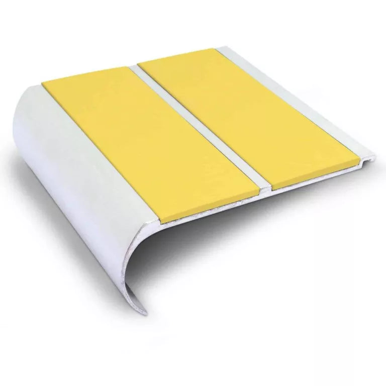 NHD13 non-slip stair nosing 91×35mm installed on a UK stair edge with textured grip surface for improved safety. 12